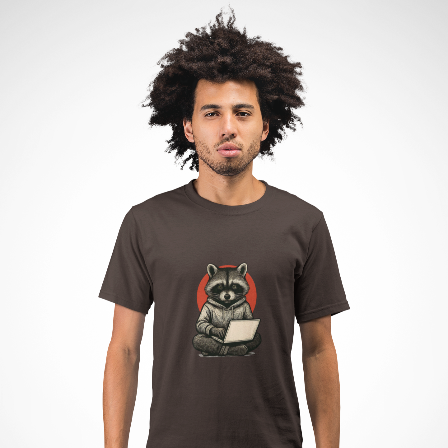 Man wearing a brown t-shirt with a raccoon graphic on a white background