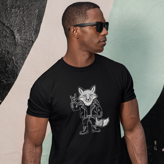 Man wearing a black t-shirt with a graphic design of a fox and text, standing against a colorful wall.