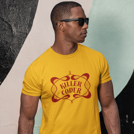 Man wearing a yellow t-shirt with 'Killer Coder' design against a colorful abstract background