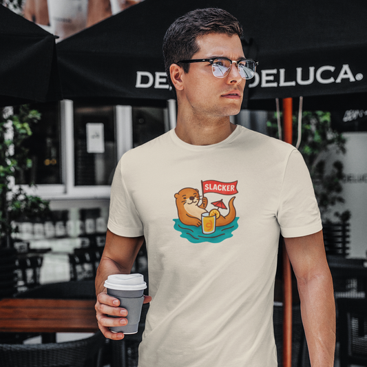 Man wearing a t-shirt with a graphic design, holding a coffee cup in an outdoor setting.