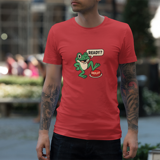 Person wearing a red t-shirt with a graphic design of a frog and text outdoors.