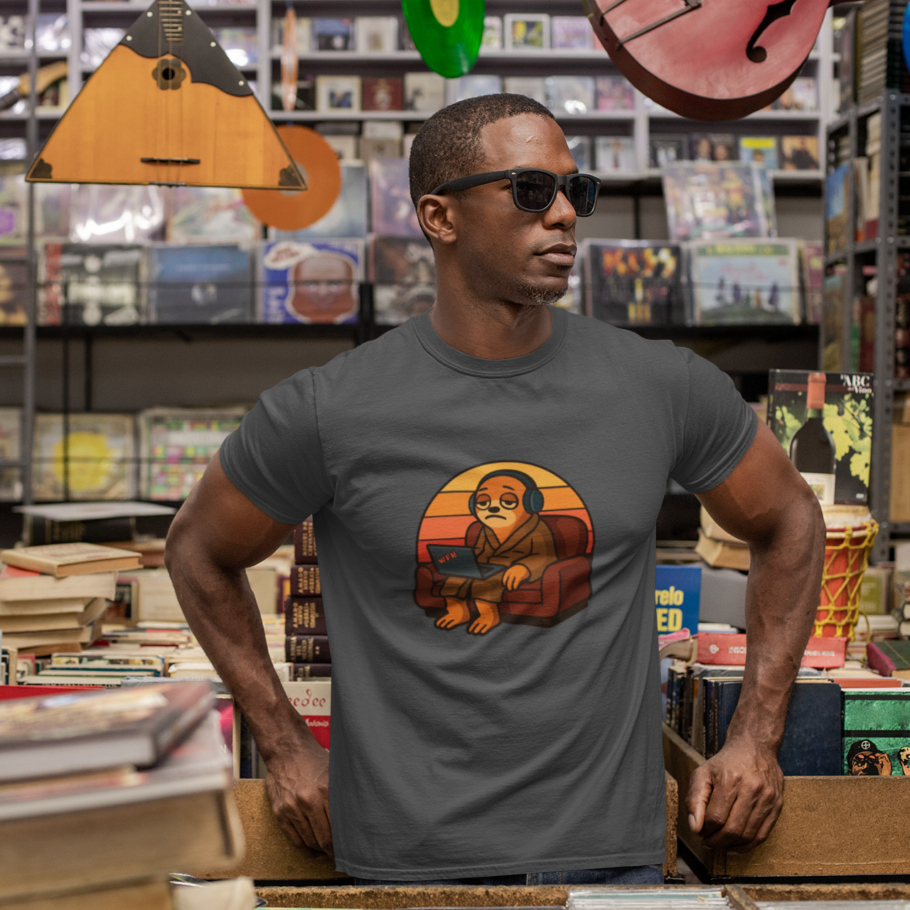 Man wearing a t-shirt with a graphic design in a music store