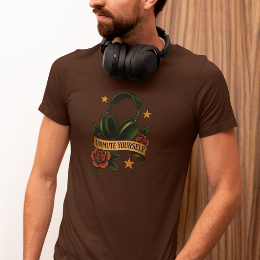 Person wearing a brown t-shirt with a graphic design and text, standing against a wooden panel background.