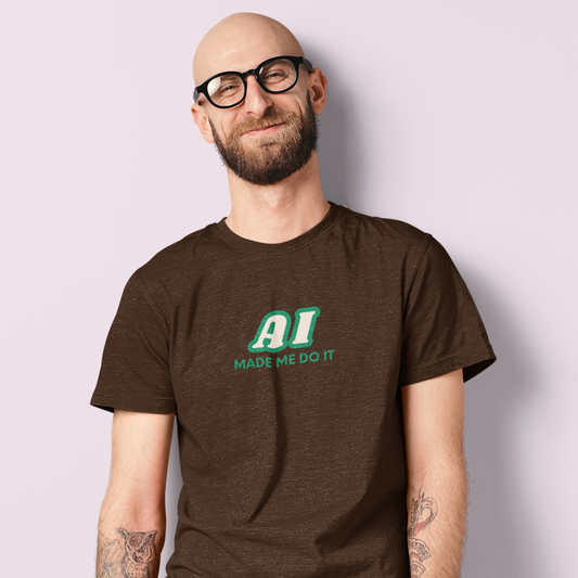 Man wearing a brown t-shirt with 'AI Made Me Do It' text against a light purple background